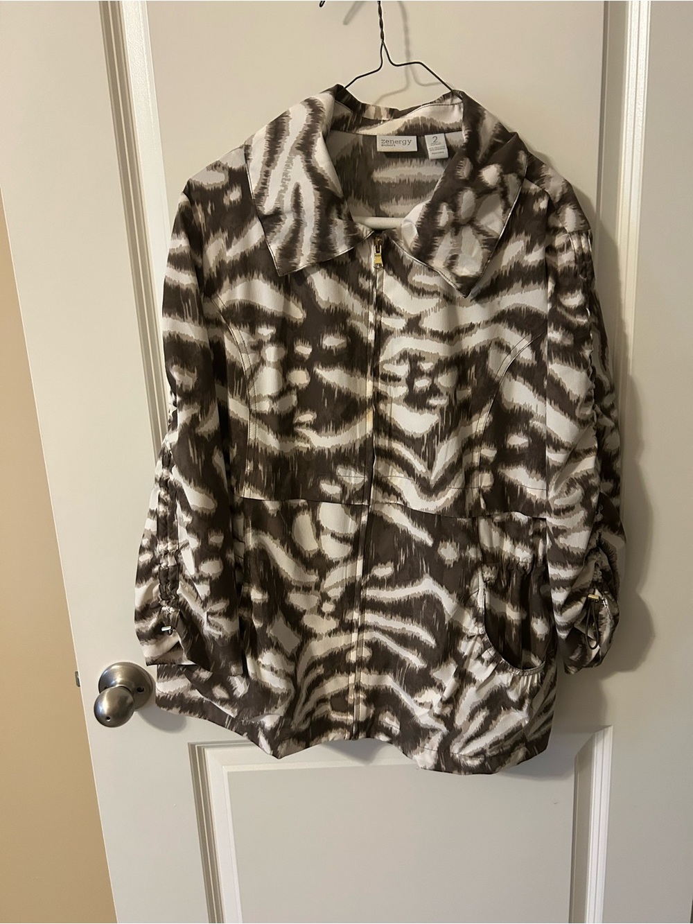 Chico's Zenergy collection. Brown & White Printed Zip-Front Jacket